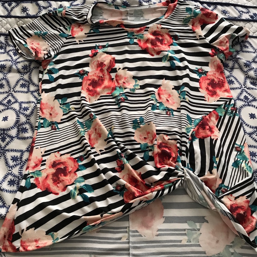 Black and flowered shirt